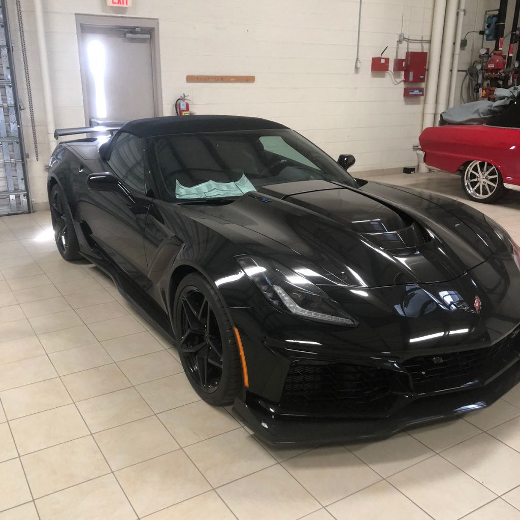 A detailed black Corvette