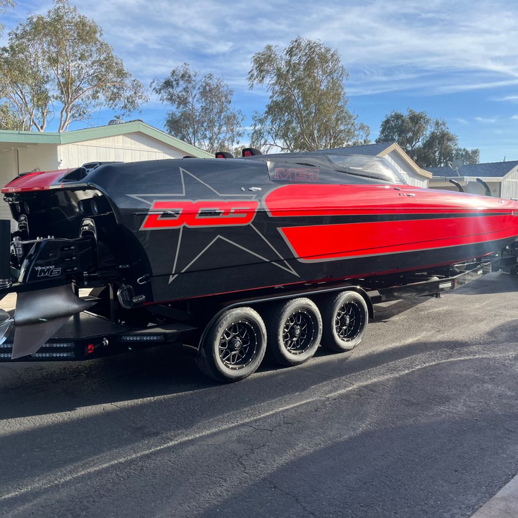 A red and black competition speed boat